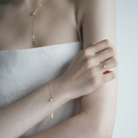 メレダイヤチャーム18K Yラインネックレス