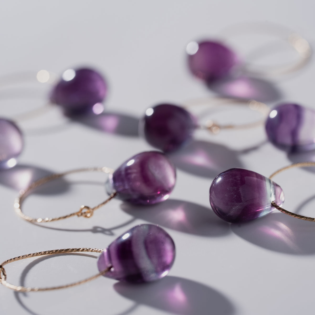 フローライトフープピアス｜SUNSET PURPLE